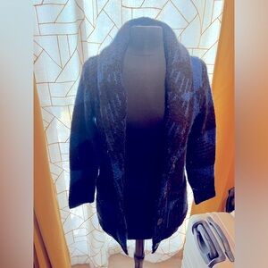 1 <3 h1981. Discontinued line, apparel is still apparent today. Sweater jacket.